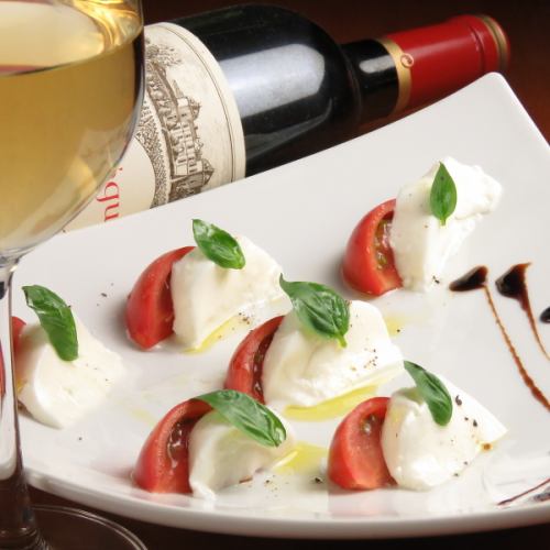 Caprese with Mozzarella Cheese and Fruit Tomatoes